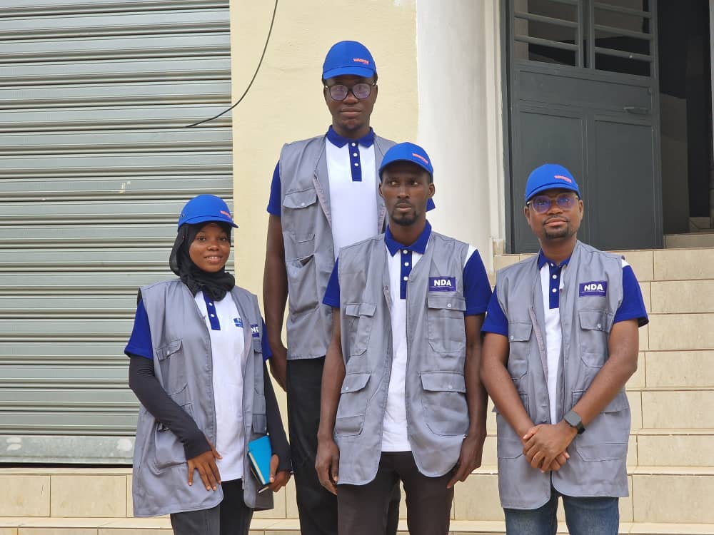 Photo d'équipe en tenue de chantier